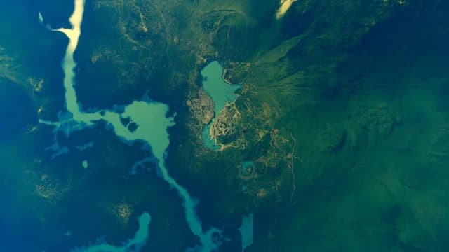 Abstract aerial flow image used to represent momentum and constraint.